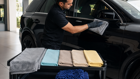 Microfiber car towels separated for drying glass interior detailing and wheel cleaning