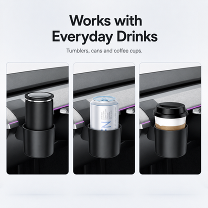 Tesla dashboard cup holder shown with a tumbler, beverage can, and takeaway coffee cup